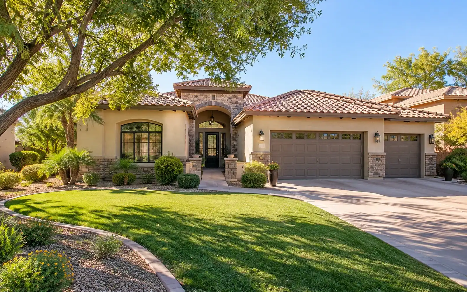 Gilbert home with a covered patio, pool and lake view